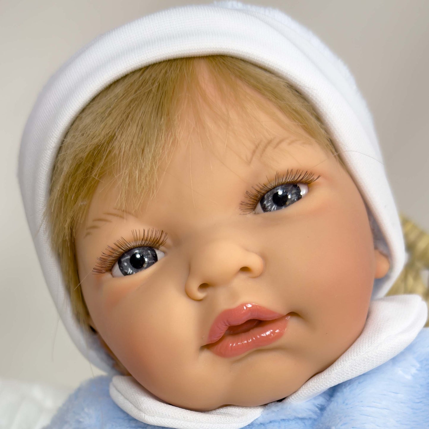 BABY DOLL WEARS BLUE HAIR WITH CUSHION INCLUDED